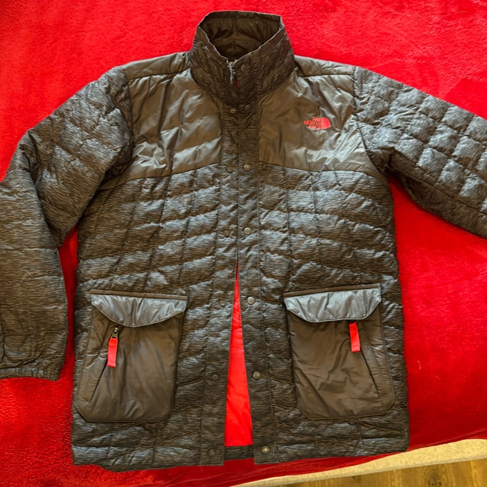 North Face Boys puffer jacket. Lightweight but warm.